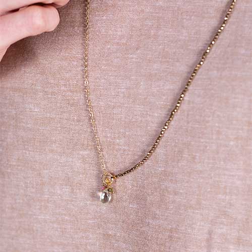 Half chain half gem necklace with light green amethyst side detail